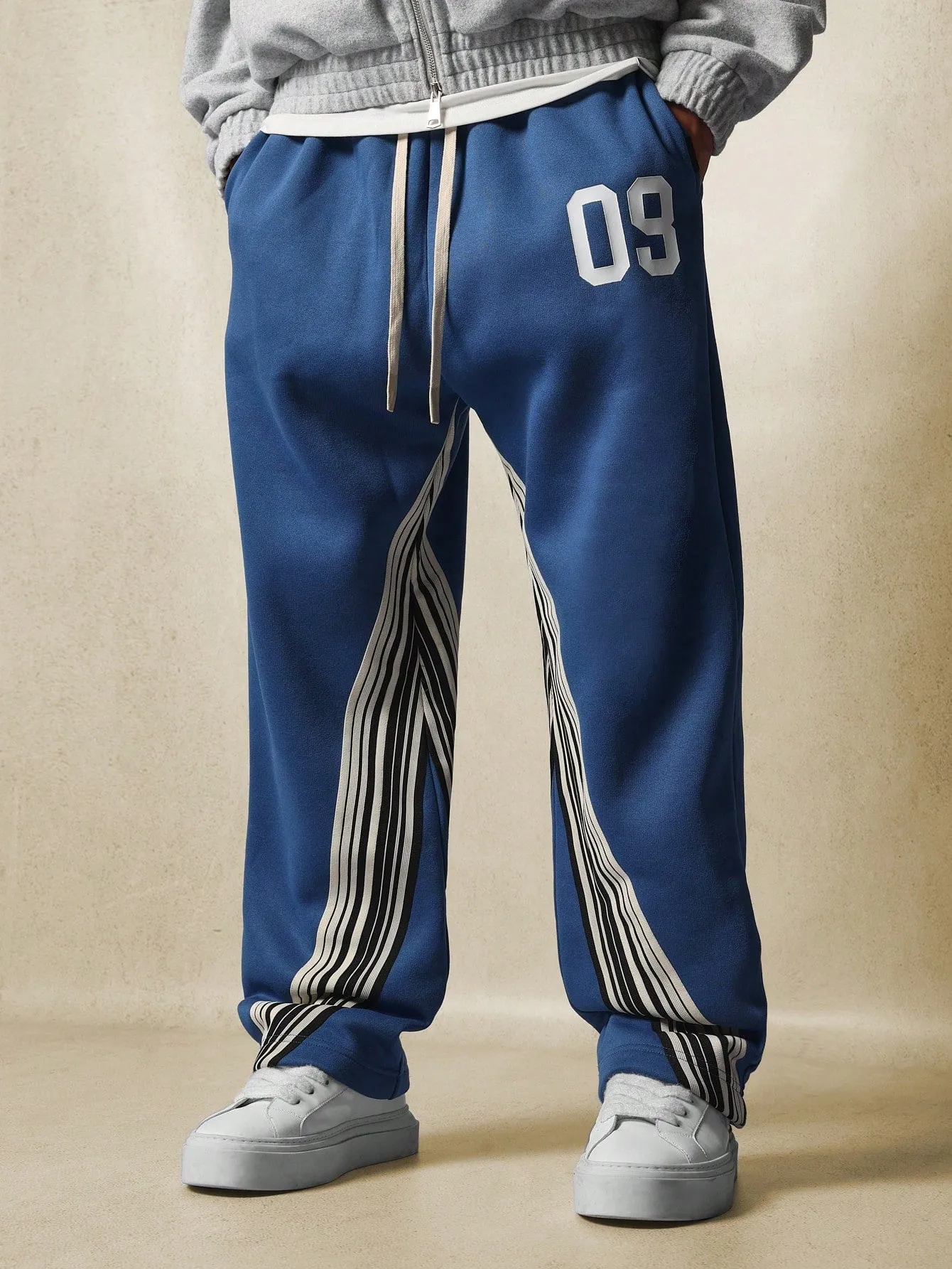 Wide Fit Drop Crotch Sweatpants With Stripe Tape & Graphic Print